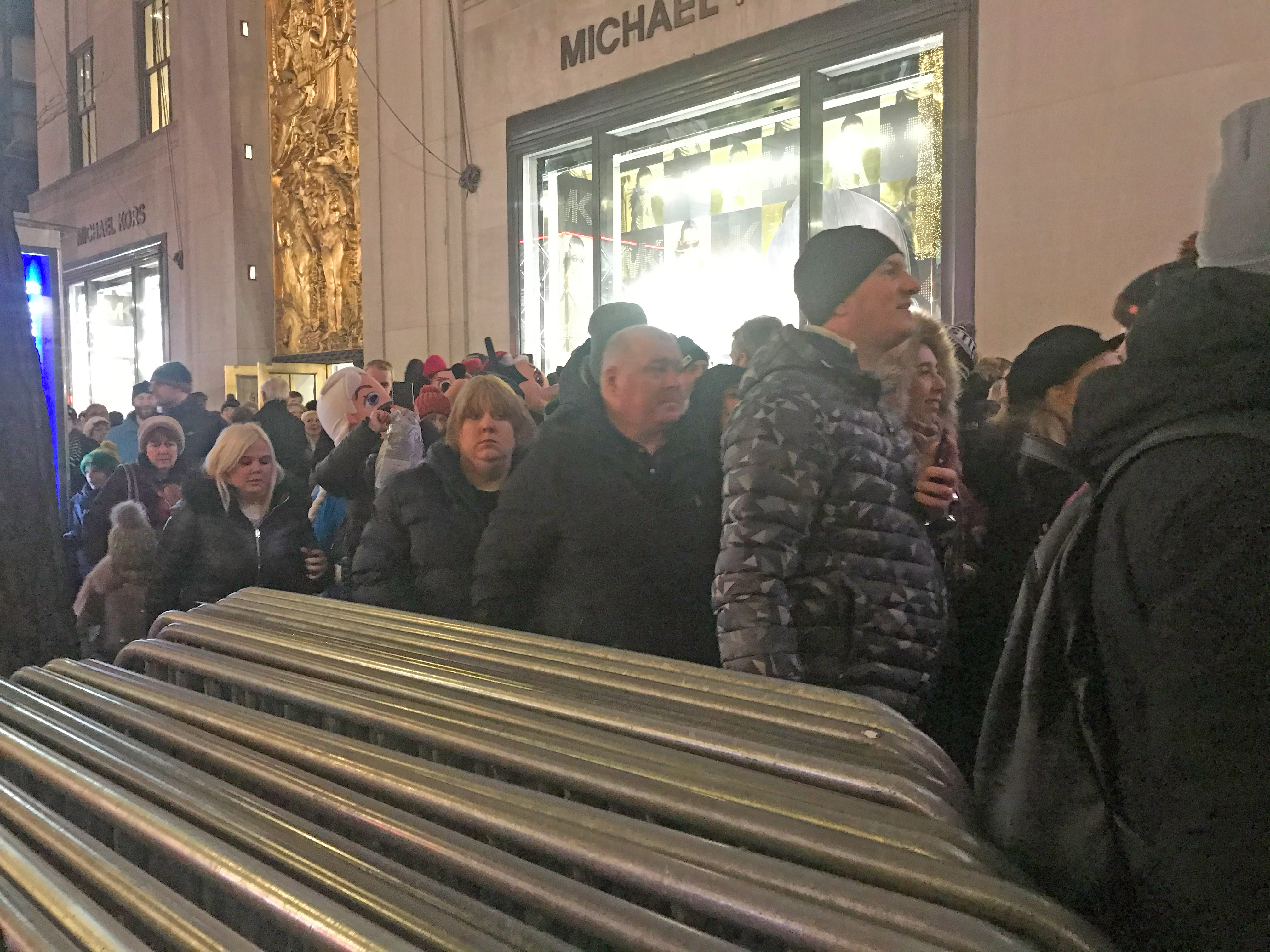 Barriers block people into Fifth Avenue, instead of letting them walk freely between the sidewalk and temporary sidewalk. Photo: Julianne Cuba