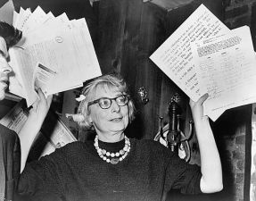 Jane Jacobs holding up petitions. No, Arthur Schwartz, your fight against the 14th Street Busway is the antithesis of her sallies against Robert Moses's highways. Image: Wikimedia