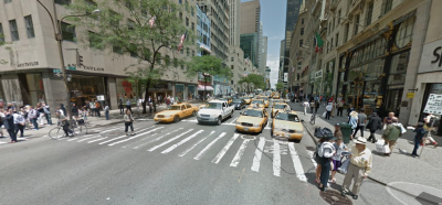 Fifth Avenue at 48th Street: Lots of space for cars, cramped conditions on the margins for people walking and biking. Photo: Google Maps