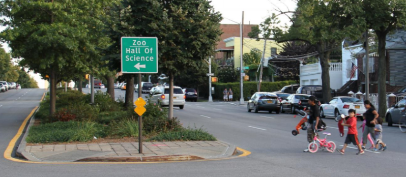 Crossing 111th Street to get to Flushing Meadows Corona Park is like crossing a highway. Photo: DOT