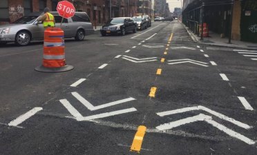 New two-way bike lane markings at West Street and Kent Street in Greenpoint. Photos: David Meyer