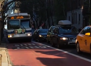 This short bus lane segment on East 97th Street lets M96 bus bypass the bottleneck preceding the traffic light.