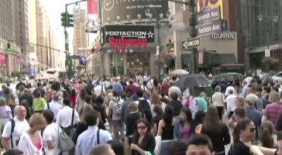 There's so much foot traffic on Seventh Avenue outside Penn Station that people routinely walk in car lanes. Image: Streetfilms
