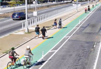 The redesigned Queens Boulevard, circa 2017, with bike lane. It doesn't go far enough. Photo: NYC DOT