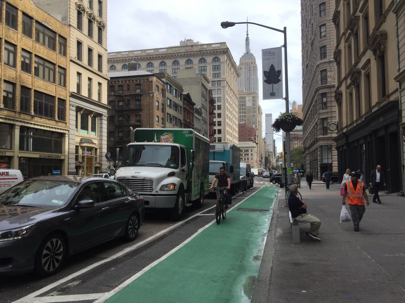 Fifth Avenue has a new protected bike lane -- but only south of 24th Street. Photo: David Meyer