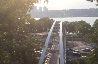 The pedestrian and bicycle bridge connecting 151st Street to the Hudson River Greenway opened last week.