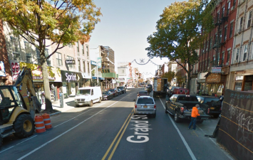 Grand Street's existing painted bike lanes are not enough to protect people from dangerous drivers. Photo: Google Street View
