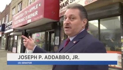 Joe Addabbo wants DOT to downgrade Woodhaven Boulevard SBS by increasing the hours drivers are allowed to park in bus lanes. Video still: NY1