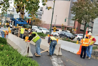 State DOT contractors placed jersey barriers on the Hudson River Greenway in 2017 to prevent cars from mowing down cyclists — but only now the state is going to improve the unprotected intersections. Photo copyright Shmuli Evers, used with permission.