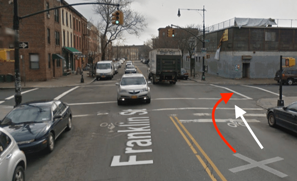 Franklin and Noble streets in Brooklyn, where an Action Carting driver killed Neftaly Ramirez and fled the scene. The red arrow indicates the direction of the driver and the white arrow indicates the path of the victim, according to reports. Image: Google Maps
