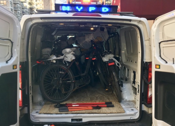 The 19th Precinct shows off the loot.