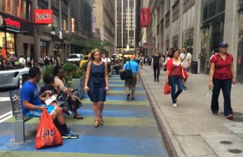 This expanded sidewalk on 32nd Street only lasted a few months. It could return -- if the MTA is willing to simplify two bus routes. Photo: Stephen Miller