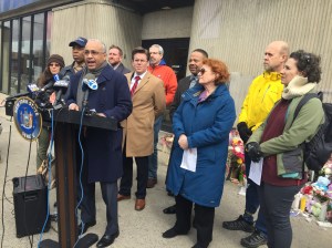 State Senator Jose Peralta and other elected officials announced a package of driver safety bills at the site of Monday's fatal crash. Photo: David Meyer