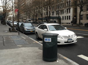 A few well-placed bollards would keep cars like this white sedan out of the No Standing zones on West End Avenue that are supposed to improve visibility at intersections. But Manhattan CB 7 has delayed a motion to request them.