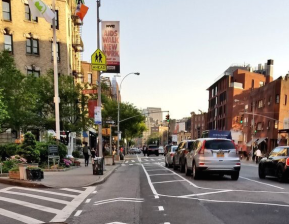 The newly-striped protected bike lane at Waverly Place on Seventh Avenue South. Photo copyright Shmuli Evers, used with permission.