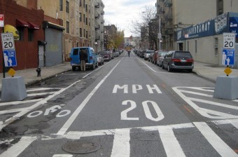Gateway treatments made with paint and signs haven't been enough to prevent reduce traffic injuries in NYC's neighborhood slow zones. Photo: Noah Kazis