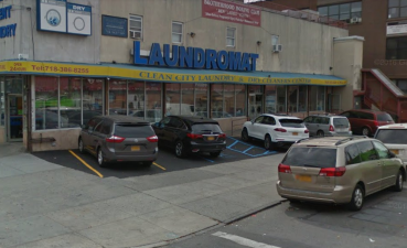 The illegal parking lot at Clean City Laundy where a driver backed out and killed Luz Gonzalez last month. Image via Google Maps