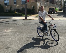 You won't see this site in the Rockaways any more — a man on a Pace bike. Photo: Mary Ellen Burke
