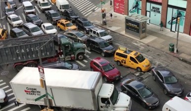 A typical scene on Varick Street. You can tell it's a still because there's no honking.