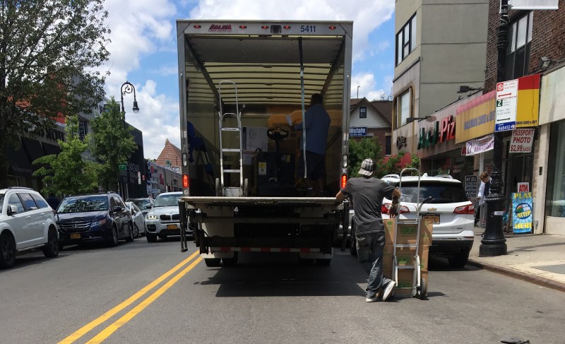 Business as usual on traffic-choked Austin Street in Forest Hills. Photo: Laura A. Shepard