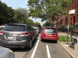 On Monday morning, this car was still blocking the new Ninth Street bike lane. Photos: Gersh Kuntzman