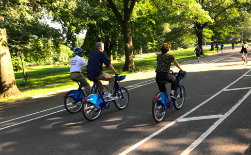 Mayor de Blasio (center with Borough President Eric Adams and DOT Commissioner Polly Trottenberg) was last seen riding a bike in August, 2018. Photo: Natalie Grybauskas