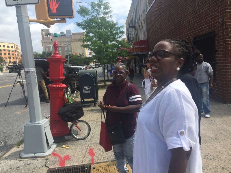 Alicka Ampry-Samuel (right) and her mother Ernestine Turner watch as drivers whip around the corner of Howard Avenue and Pitkin Avenue. Photo: David Meyer