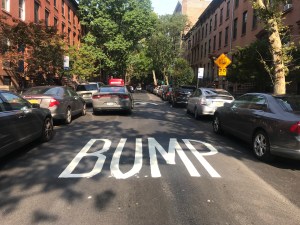 Someone painted "BUMP" too widely on Schermerhorn Street between Court and Clinton streets, meaning it will have to be redone if the city restores the bike lane. Photo: Gersh Kuntzman