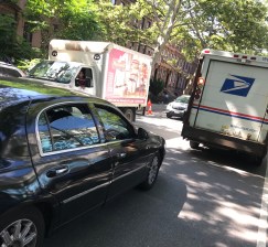 CB2 is trying to avoid this typical scene in residential areas: delivery trucks drouble-park and endanger cyclists and motorists. Photo: Gersh Kuntzman