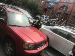 The Ninth Street blocker, as seen on Monday when a tow truck couldn't get access, is still there. And it'll be there until Saturday, its owner now admits. Photo: Gersh Kuntzman