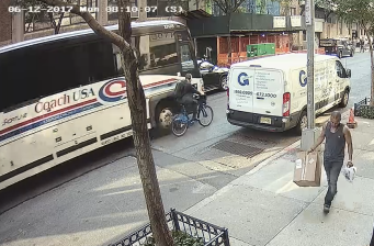 A video still shows the moment when bus driver Dave Lewis passed too closely to cyclist Dan Hanegby, who had the right of way, killing him. DA candidate Liz Crotty argues that the city's "Right of Way" Law shouldn't criminalize such crashes, which she calls "accidents."