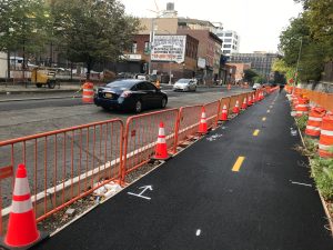 The first segment of the two-way protected bike lane on Flushing Avenue is open. Photo: Gersh Kuntzman