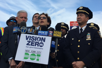 NYPD Transportation Chief Thomas Chan, right, on Northern Boulevard this morning. Photo: David Meyer