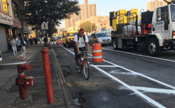 The Sunset Park segment of the 4th Avenue protected bike lane, pictured mid-installation in October. Twitter/NYC DOT
