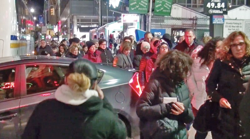A common scene in Times Square — pedestrians crammed into tight space, while drivers rule the road. Photo: Clarence Eckerson Jr.
