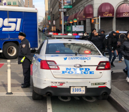 Yesterday, officers from the 88th Precinct parked in this exact location forced a cyclist into traffic, where she was injured. Today, the precinct was back in the same location. Photo: Ian Dutton