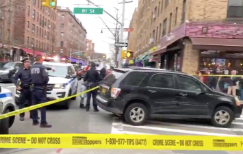 This is the scene moments after the driver hit and killed a pedestrian on the last day of 2018 in Jackson Heights. Photo: Clarence Eckerson Jr.