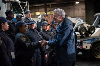 Mayor de Blasio greeting personnel from the NYPD's new bus lane tow truck units. Photo: Michael Appleton/Mayoral Photography Office