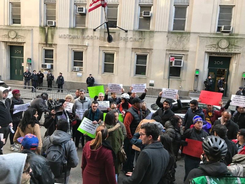 Earlier this year, cyclists and advocates rallied against the NYPD crackdown on e-bikers at the Midtown North stationhouse. Photo: Gersh Kuntzman