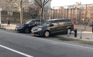 This car parked in an "NYPD-only" space at the 78th Precinct station house in Park Slope has 53 speeding tickets and five red light tickets since mid-2017. Photo: Gersh Kuntzman