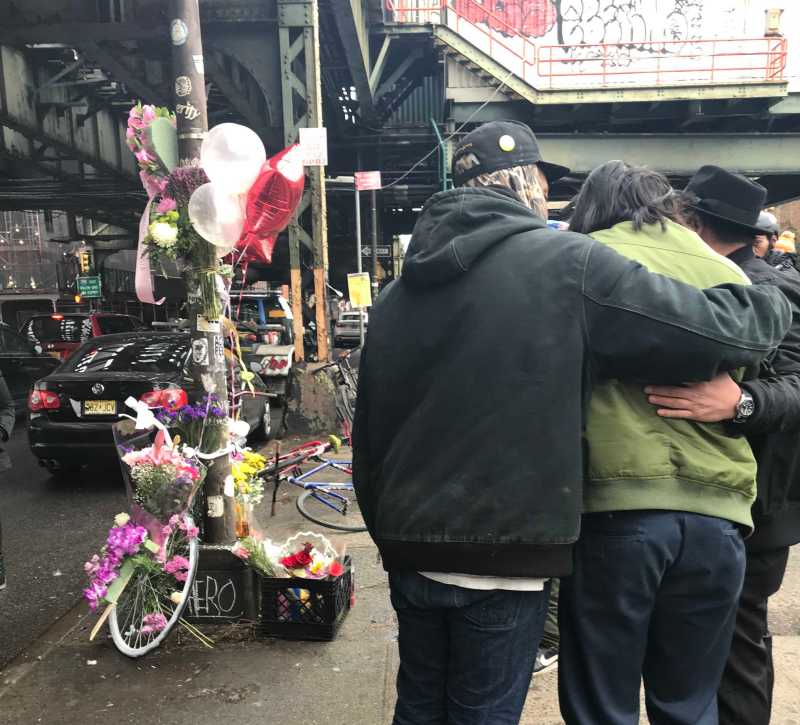 Mourners still gather at Aurilla Lawrence's ghost bike to protest her death. Photo: Julianne Cuba