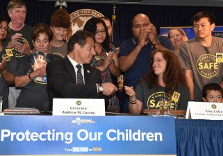 Governor Cuomo signing an executive order last summer to continue the city's school speed camera program. Photo: Kevin Coughlin/State of New York