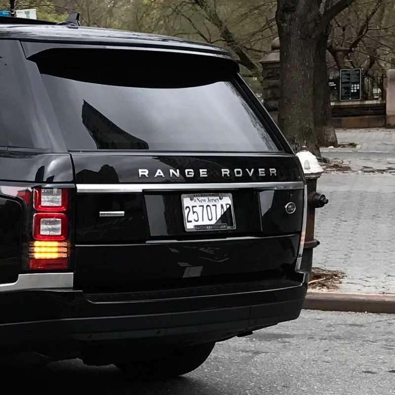 The car's license plate is partially obscured. Photo: Shayana Kadidal
