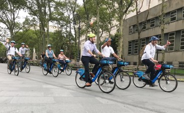 People (including former Motivate CEO Jay Walder, far right, and Brooklyn Borough President Eric Adams behind him) are using Citi Bike in increasing numbers, despite a repair crisis last fall and an e-bike breakdown this year. Photo: Gersh Kuntzman