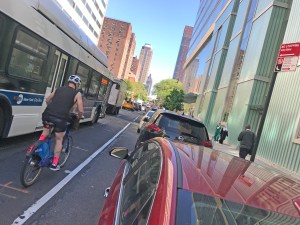 Drivers often give cyclists far less than three feet of passing distance. This is Jay Street in Downtown Brooklyn every day. Photo: Gersh Kuntzman