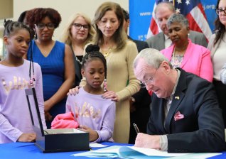 N.J. Gov. Phil Murphy has legalized e-scooters and e-bikes in the Garden State. Here he is signing a legislation (albeit a different bill, but you get the idea) last week. Photo: Edwin J. Torres/Governor’s Office.