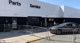 Cars get protection during a 2019 rally on 78th Street to demand the city make good on its promise to fully pedestrianize the block. Photo: Clarence Eckerson Jr.