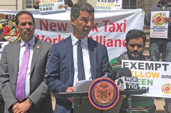 Council Member Ydanis Rodriguez rallied at City Hall Tuesday to call on Gov. Cuomo to exempt yellow taxis from congestion pricing fees. Photo: Julianne Cuba