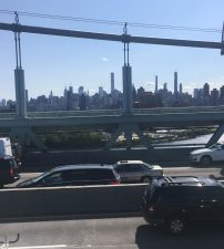 Looking over the Triboro's traffic at the Manhattan skyline. Photo: Steve Scofield