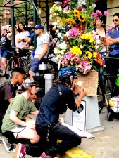 Writing condolences at the vigil for dead cyclist Robyn Hightman. Photo: Yosef Kessler